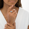 Thumbnail Image 2 of 8.0mm Cushion-Cut Swiss Blue Topaz and 4.0mm Lab-Created White Sapphire Three Stone Ring in Sterling Silver