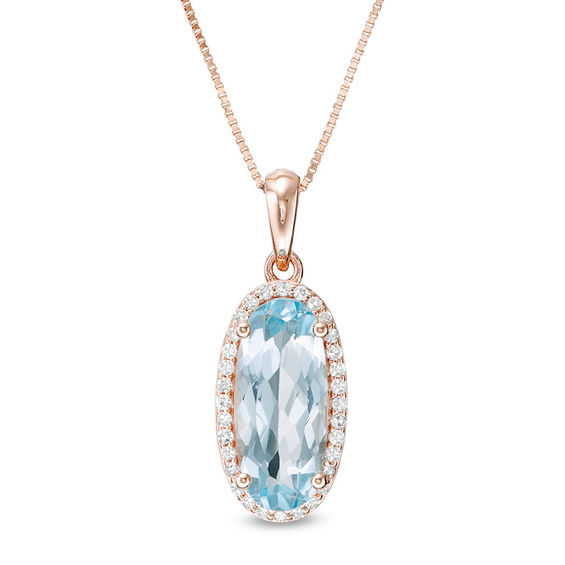 Elongated Oval Sky Blue Topaz and 1/6 CT. T. Diamond Frame Drop Pendant in 10K Rose Gold