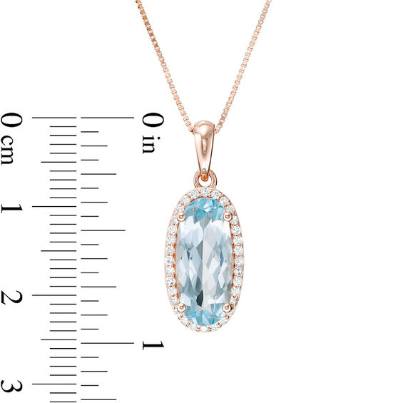 Elongated Oval Sky Blue Topaz and 1/6 CT. T. Diamond Frame Drop Pendant in 10K Rose Gold