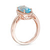 Thumbnail Image 3 of Elongated Oval Sky Blue Topaz and 1/6 CT. T.W. Diamond Frame Ring in 10K Rose Gold