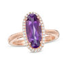 Thumbnail Image 1 of Elongated Oval Amethyst and 1/6 CT. T.W. Diamond Frame Ring in 10K Rose Gold