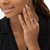 Thumbnail Image 1 of Elongated Oval Amethyst and 1/6 CT. T.W. Diamond Frame Ring in 10K Rose Gold