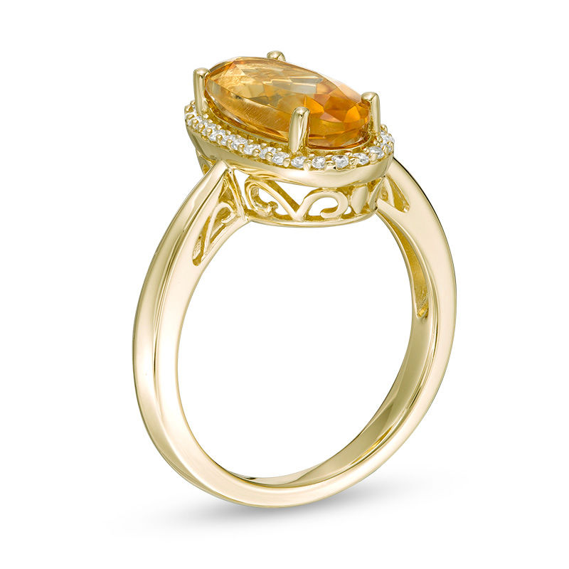 Main Image 3 of Elongated Oval Citrine and 1/6 CT. T.W. Diamond Frame Ring in 10K Gold