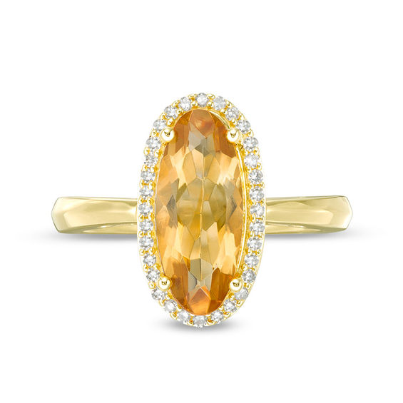 Elongated Oval Citrine and 1/6 CT. T.w. Diamond Frame Ring in 10K Gold