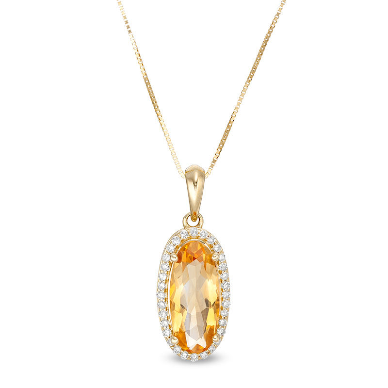 Main Image 1 of Elongated Oval Citrine and 1/6 CT. T.W. Diamond Frame Drop Pendant in 10K Gold