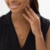 Thumbnail Image 2 of Elongated Oval Citrine and 1/6 CT. T.W. Diamond Frame Drop Pendant in 10K Gold