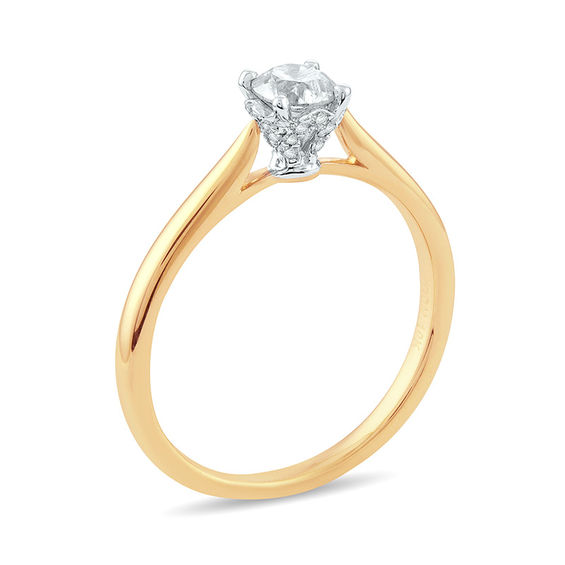 1/ CT. T.w. Diamond Solitaire Engagement Ring in 10K Gold