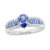 Thumbnail Image 0 of Pear-Shaped and Round Tanzanite and 1/20 CT. T.W. Diamond Triple Row Ring in 10K White Gold