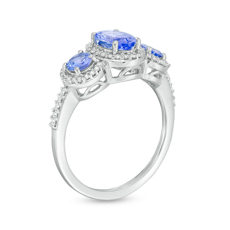 Oval Tanzanite and 1/5 CT. T.W. Diamond Frame Three Stone Ring in Sterling Silver
