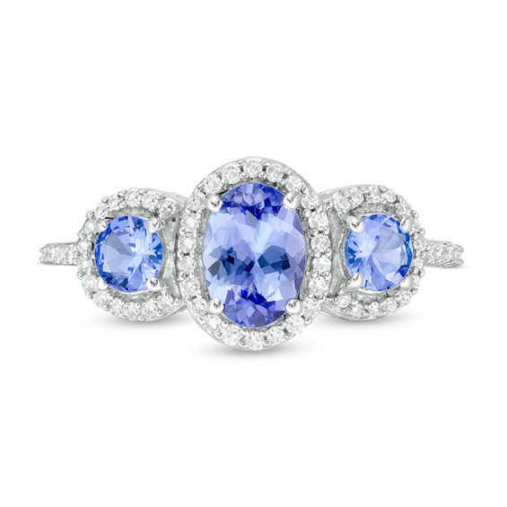 Oval Tanzanite and 1/5 CT. T.w. Diamond Frame Three Stone Ring in Sterling Silver