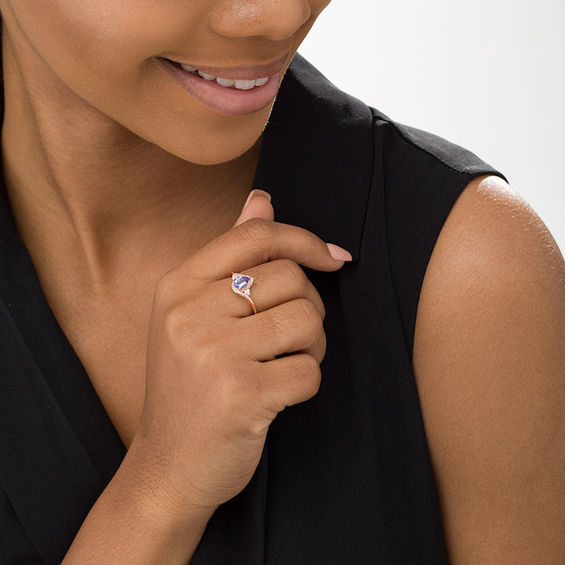 Pear-Shaped Tanzanite and 1/10 CT. T.w. Diamond Tri-Sides Bypass Ring in 10K Rose Gold