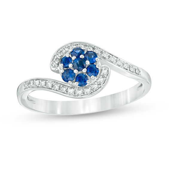 Blue Sapphire and 1/20 CT. T.w. Diamond Swirl Bypass Ring in 10K White Gold
