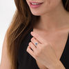 Thumbnail Image 2 of Blue Sapphire and 1/20 CT. T.W. Diamond Swirl Bypass Ring in 10K White Gold