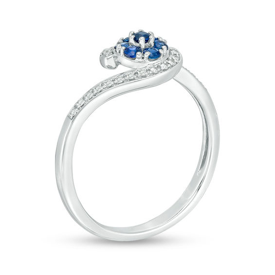Blue Sapphire and 1/20 CT. T.w. Diamond Swirl Bypass Ring in 10K White Gold