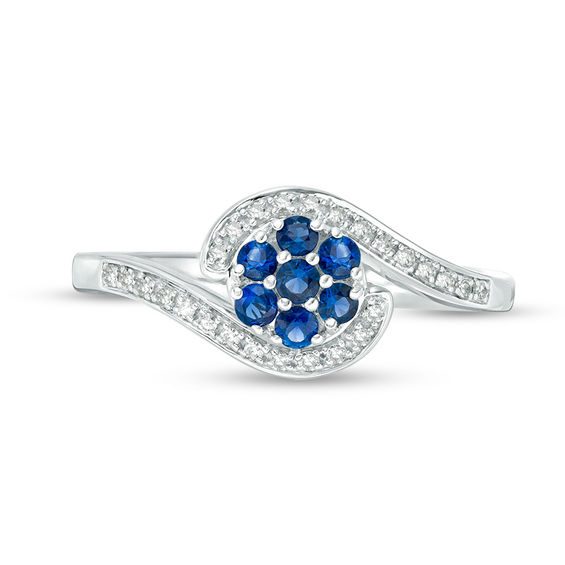Blue Sapphire and 1/20 CT. T.w. Diamond Swirl Bypass Ring in 10K White Gold