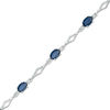Thumbnail Image 1 of Oval Blue Sapphire and Diamond Accent Station Bracelet in 10K White Gold - 7.5"