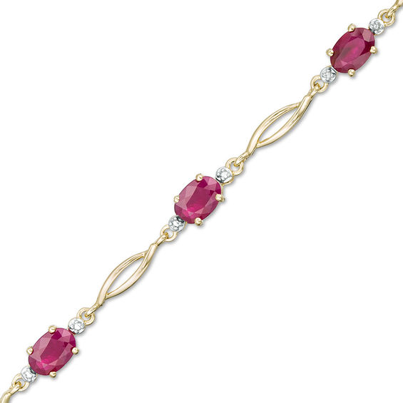 Oval Ruby and Diamond Accent Station Bracelet in 10K Gold - 7.5"
