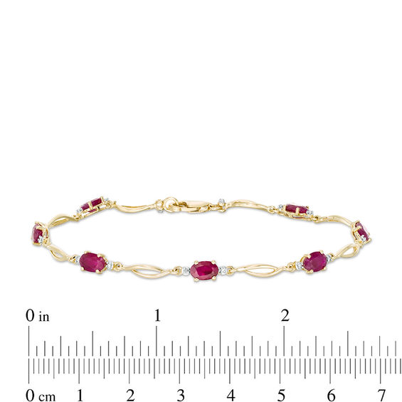 Oval Ruby and Diamond Accent Station Bracelet in 10K Gold - 7.5"