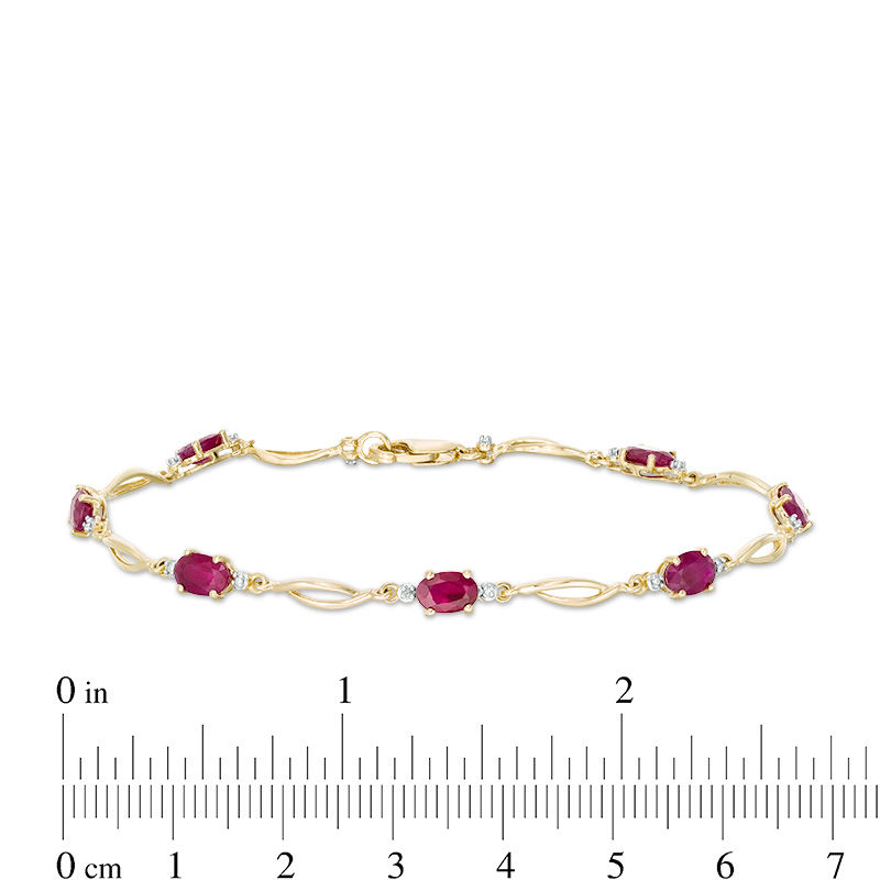 Main Image 4 of Oval Ruby and Diamond Accent Station Bracelet in 10K Gold - 7.5"