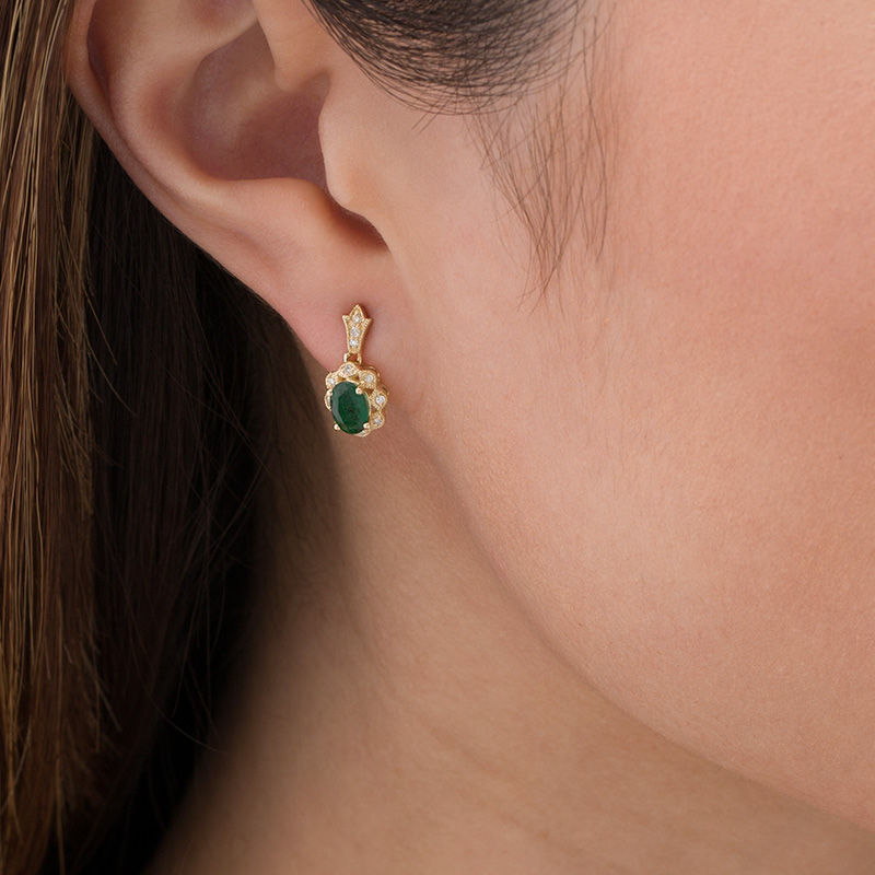 Oval Emerald and 1/15 CT. T.W. Diamond Vintage-Style Drop Earrings in 10K Gold