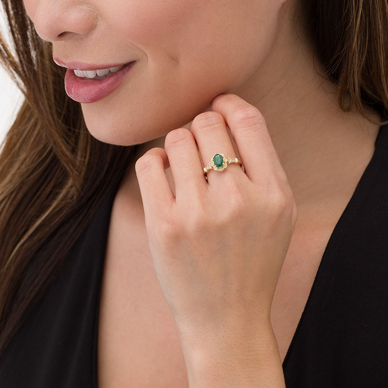 Main Image 2 of Oval Emerald and 1/15 CT. T.W. Diamond Vintage-Style Ring in 10K Gold