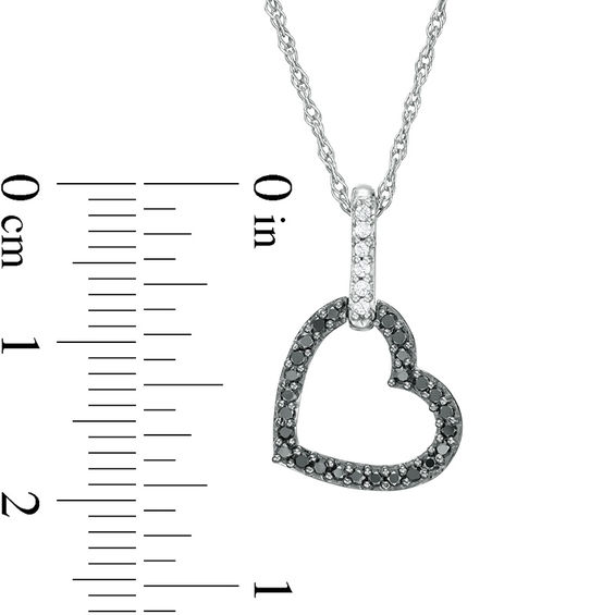 1/6 CT. T.w. Enhanced Black and White Diamond Tilted Heart Outline Pendant in Sterling Silver