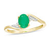 Thumbnail Image 1 of Oval Emerald and Diamond Accent Flame Bypass Ring in 10K Gold