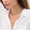 Thumbnail Image 2 of 1 CT. T.W. Baguette and Round Diamond Starburst Heart Pendant in 10K Gold