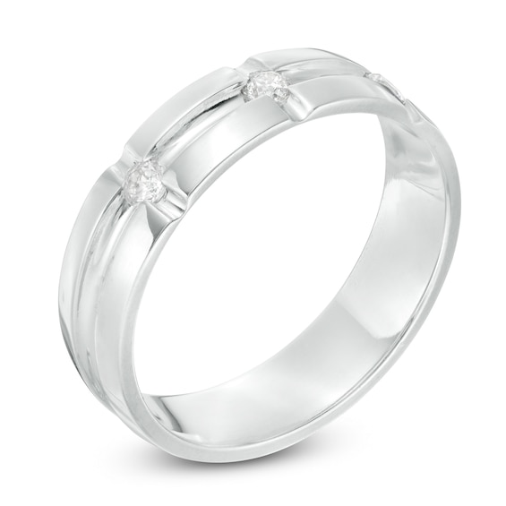 1/5 CT. T.w. Diamond Three Stone Groove Wedding Band in Platinum