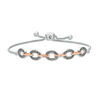 Thumbnail Image 1 of 1/4 CT. T.W. Enhanced Champagne Diamond Oval Outline Link Bolo Bracelet in Sterling Silver and 10K Rose Gold - 9.5"