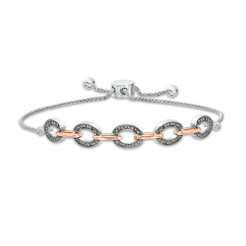 Main Image 1 of 1/4 CT. T.W. Enhanced Champagne Diamond Oval Outline Link Bolo Bracelet in Sterling Silver and 10K Rose Gold - 9.5"
