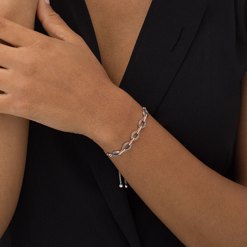 Main Image 2 of 1/4 CT. T.W. Enhanced Champagne Diamond Oval Outline Link Bolo Bracelet in Sterling Silver and 10K Rose Gold - 9.5"