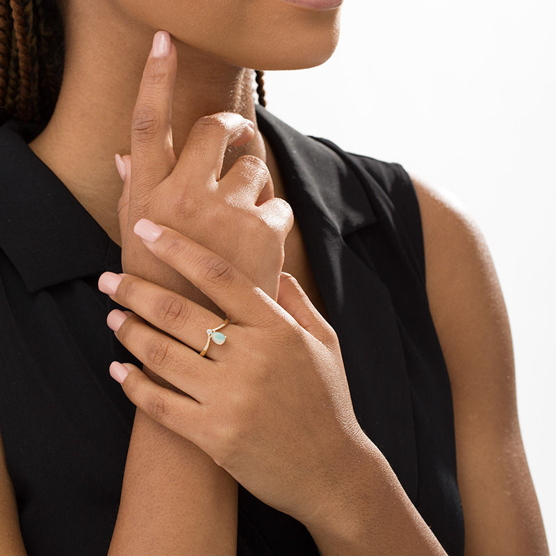 Main Image 2 of Pear-Shaped Opal and Diamond Accent Chevron Ring in 10K Gold