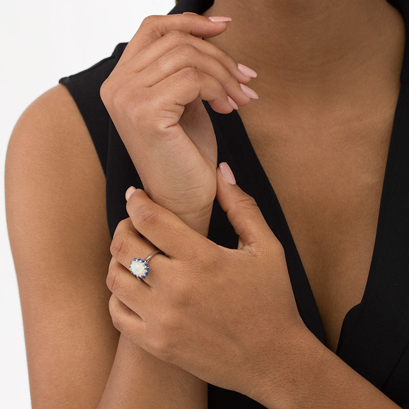 Main Image 2 of Oval Opal, Blue Sapphire and 1/15 CT. T.W. Diamond Double Sunburst Frame Ring in 10K White Gold