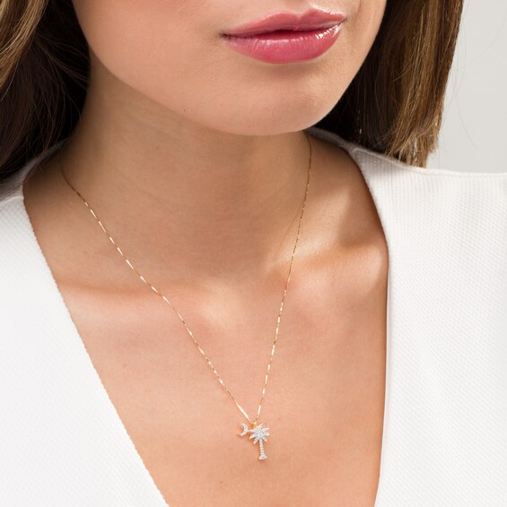 1/6 CT. T.w. Diamond Palm Tree with Moon Pendant in 14K Gold