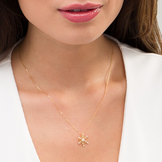 1/10 CT. T.w. Diamond Snowflake Pendant in 10K Gold