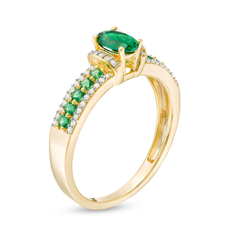 Oval Emerald and 1/10 CT. T.W. Diamond Collar Ring in 10K Gold | Zales