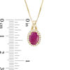 Thumbnail Image 3 of Oval Ruby and 1/10 CT. T.W. Diamond Frame Pendant in 10K Gold