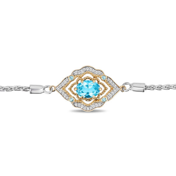 Enchanted Disney Aladdin Oval Swiss Blue Topaz and 1/15 CT. T.w. Diamond Bolo Bracelet in Sterling Silver and 10K Gold