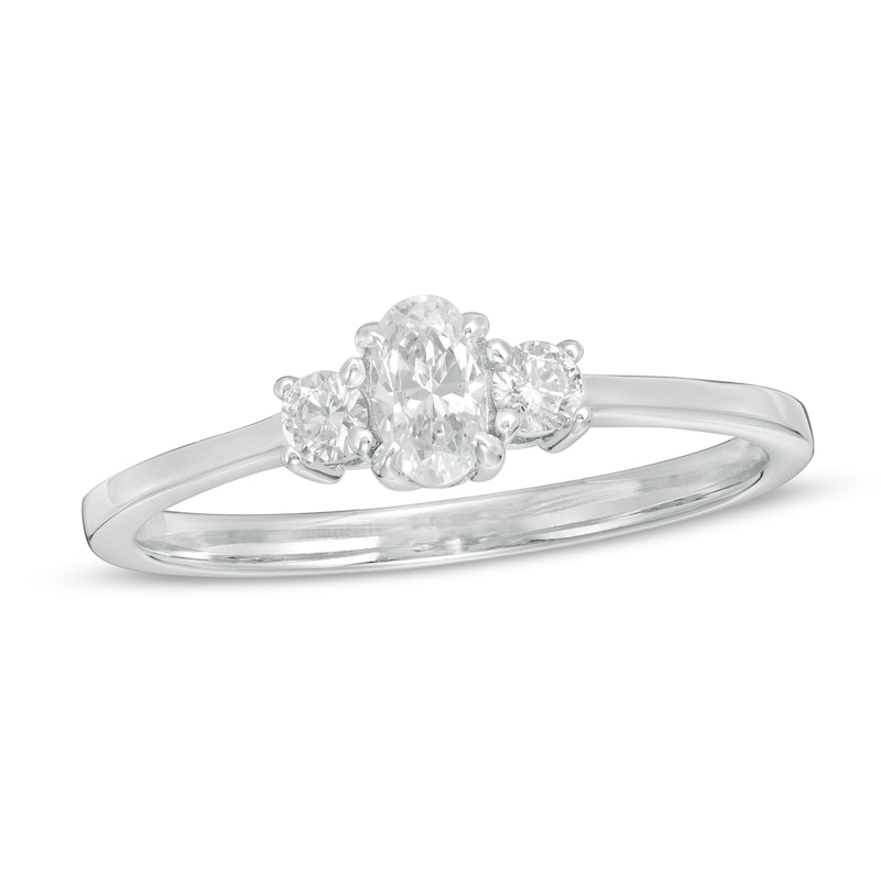 Main Image 1 of 1/2 CT. T.W. Oval and Round Diamond Three Stone Engagement Ring in 14K White Gold