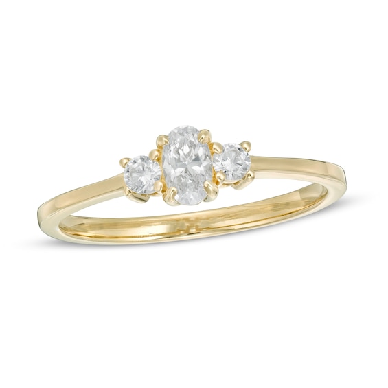 1/2 CT. T.w. Oval and Round Diamond Three Stone Engagement Ring in 14K Gold