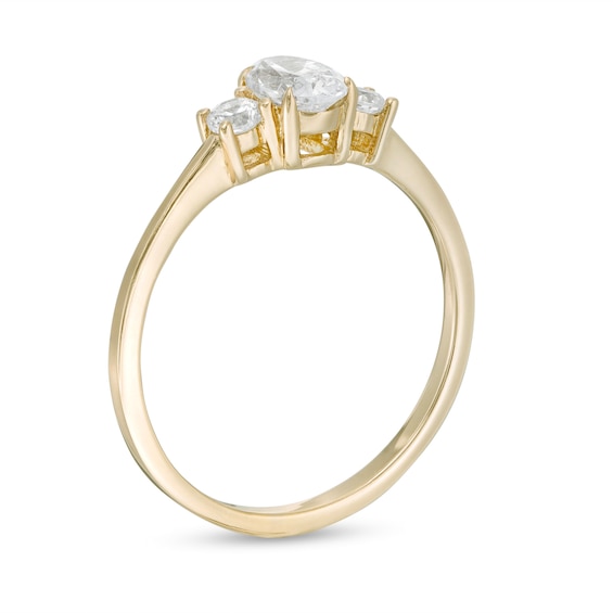 5/8 CT. T.w. Oval and Round Diamond Three Stone Engagement Ring in 14K Gold
