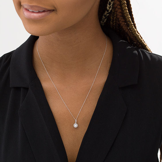 1/4 CT. T.w. Diamond Twist Frame Pendant in 10K White Gold