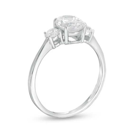 1-1/4 CT. T.w. Oval and Round Diamond Three Stone Engagement Ring in 14K White Gold