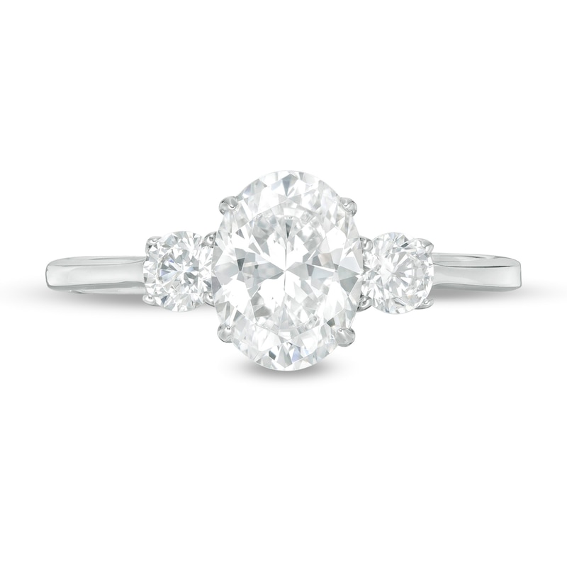 Main Image 4 of 1-1/4 CT. T.W. Oval and Round Diamond Three Stone Engagement Ring in 14K White Gold
