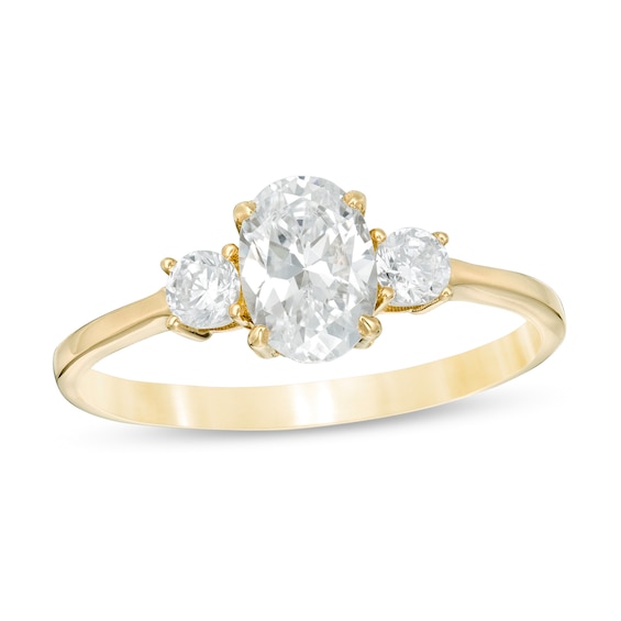 1 CT. T.w. Oval and Round Diamond Three Stone Engagement Ring in 14K Gold