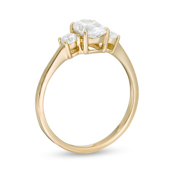 1 CT. T.w. Oval and Round Diamond Three Stone Engagement Ring in 14K Gold