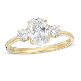 1-1/4 CT. T.W. Oval and Round Diamond Three Stone Engagement Ring in 14K Gold
