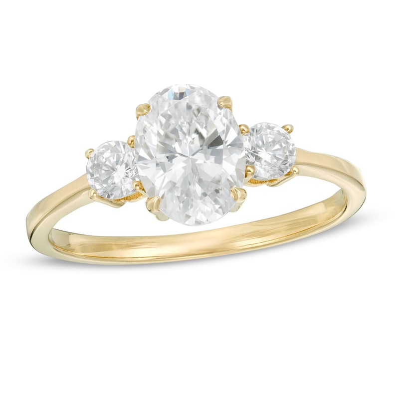 Main Image 1 of 1-1/4 CT. T.W. Oval and Round Diamond Three Stone Engagement Ring in 14K Gold