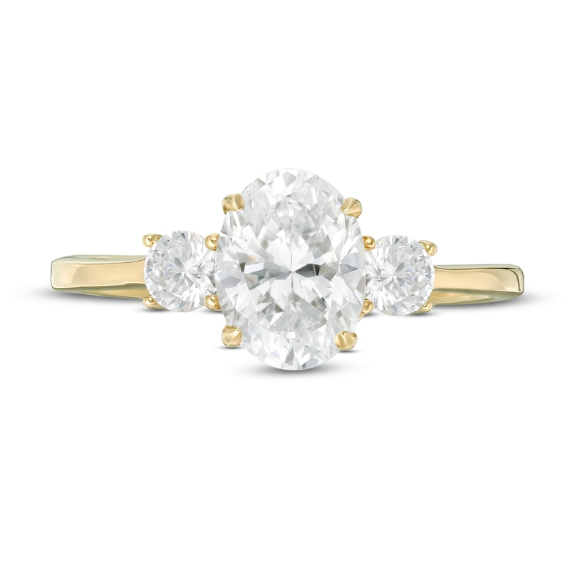 Main Image 4 of 1-1/4 CT. T.W. Oval and Round Diamond Three Stone Engagement Ring in 14K Gold